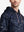 Upper front collar detail of trendy print fleece hoodies, neat stitching with splatter accent