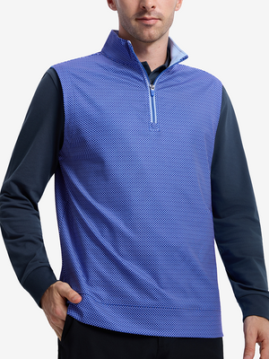 Front upper body shot of model wearing cobalt wave full print quarter zip sleeveless vest pullover