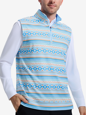 Front upper body shot of model wearing blue ethnic  full print quarter zip sleeveless vest pullover