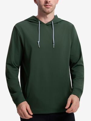 Front view of model showcasing forest green soft stretchy hoodie with inner print hood