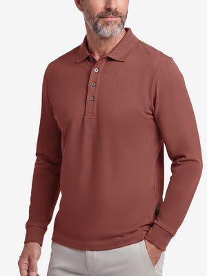 Front upper body shot of model wearing wine solid stretch cotton pique long sleeve polo shirts