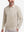 Front upper body shot of model wearing light khaki solid stretch cotton pique long sleeve polo shirts