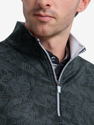 Close-up front view from nose to chest of model wearing black grey leaf2 full print quarter zip sleeveless vest pullover