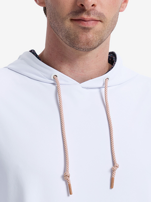 Close-up front view from nose to chest of model wearing white soft stretchy hoodie with inner print hood