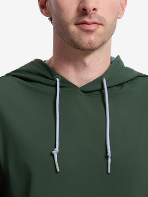 Close-up front view from nose to chest of model wearing forest green soft stretchy hoodie with inner print hood