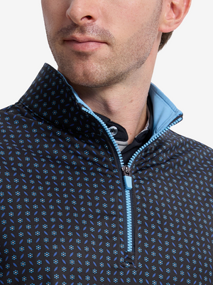 Close-up front view from nose to chest of model wearing navy flower  full print quarter zip sleeveless vest pullover