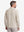 Back upper body shot of model wearing light khaki solid stretch cotton pique long sleeve polo shirts