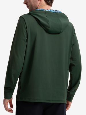 Back view of model showcasing forest green soft stretchy hoodie with inner print hood