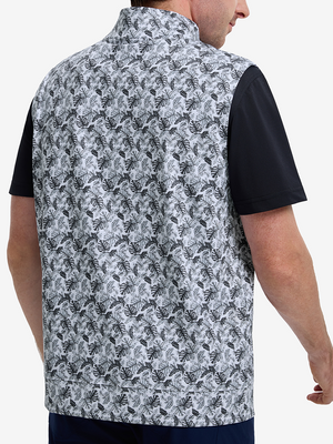 Back upper body shot of model wearing black grey leaf1 full print quarter zip sleeveless vest pullover