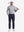 Front full body shot of model wearing grey warm brushed mock neck golf t shirt with golf club resting on shoulder