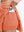 Detail view of inner pocket on peach pink women's moisture-wicking athletic tennis skirts
