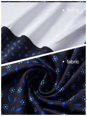 Close-up view of navy flower   full print quarter zip sleeveless vest pullover showing inner lining and outer fabric  details