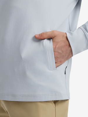 Close-up view of misty blue soft stretchy hoodie with inner print hood outer pocket detail