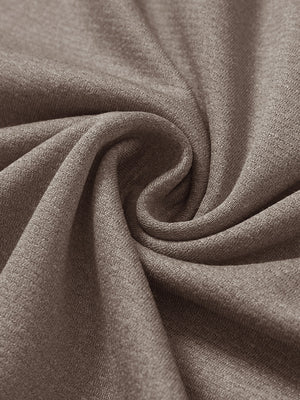 Close-up texture of  brown melange  lightweight sleeveless quarter zip golf vest fabric showing detailed premium material and weave