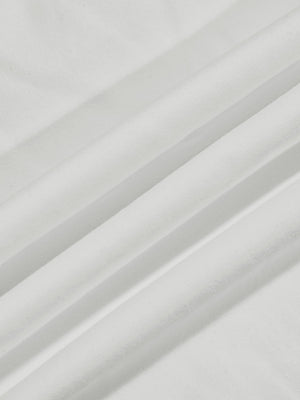 Close-up texture of  beige warm brushed mock neck golf t shirt fabric showing detailed premium material and weave