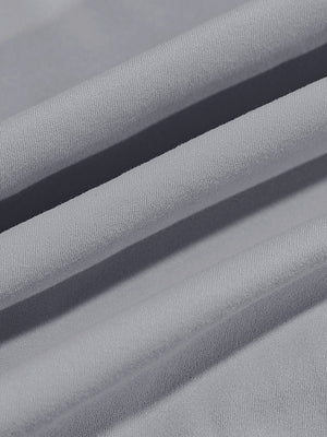 Close-up texture of  grey warm brushed mock neck golf t shirt fabric showing detailed premium material and weave