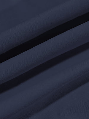 Close-up texture of  navy warm brushed mock neck golf t shirt fabric showing detailed premium material and weave