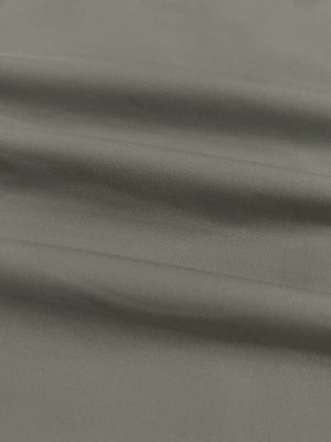 Close-up of lightweight breathable fabric texture, showing fine woven details, lightweight upf50+ short sleeve golf vests jacket in khaki grey