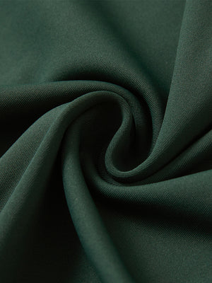 Close-up texture of  forest green soft stretchy hoodie with inner print hood fabric showing detailed premium material and weave