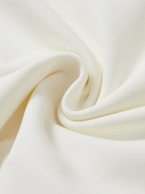 Close-up texture of  cream soft stretchy hoodie with inner print hood fabric showing detailed premium material and weave