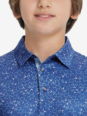 Front view of youth wearing blue molecular structure performance print boys golf polo, showing collar and chest fit