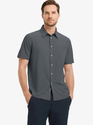 Half-body front view holding a golf club, wearing the DARK GREY polo on the course.